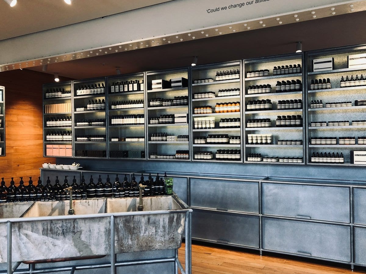 A retail store with full shelves of product
