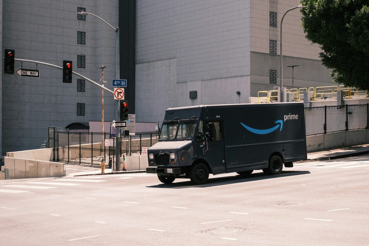 An Amazon prime truck on the road