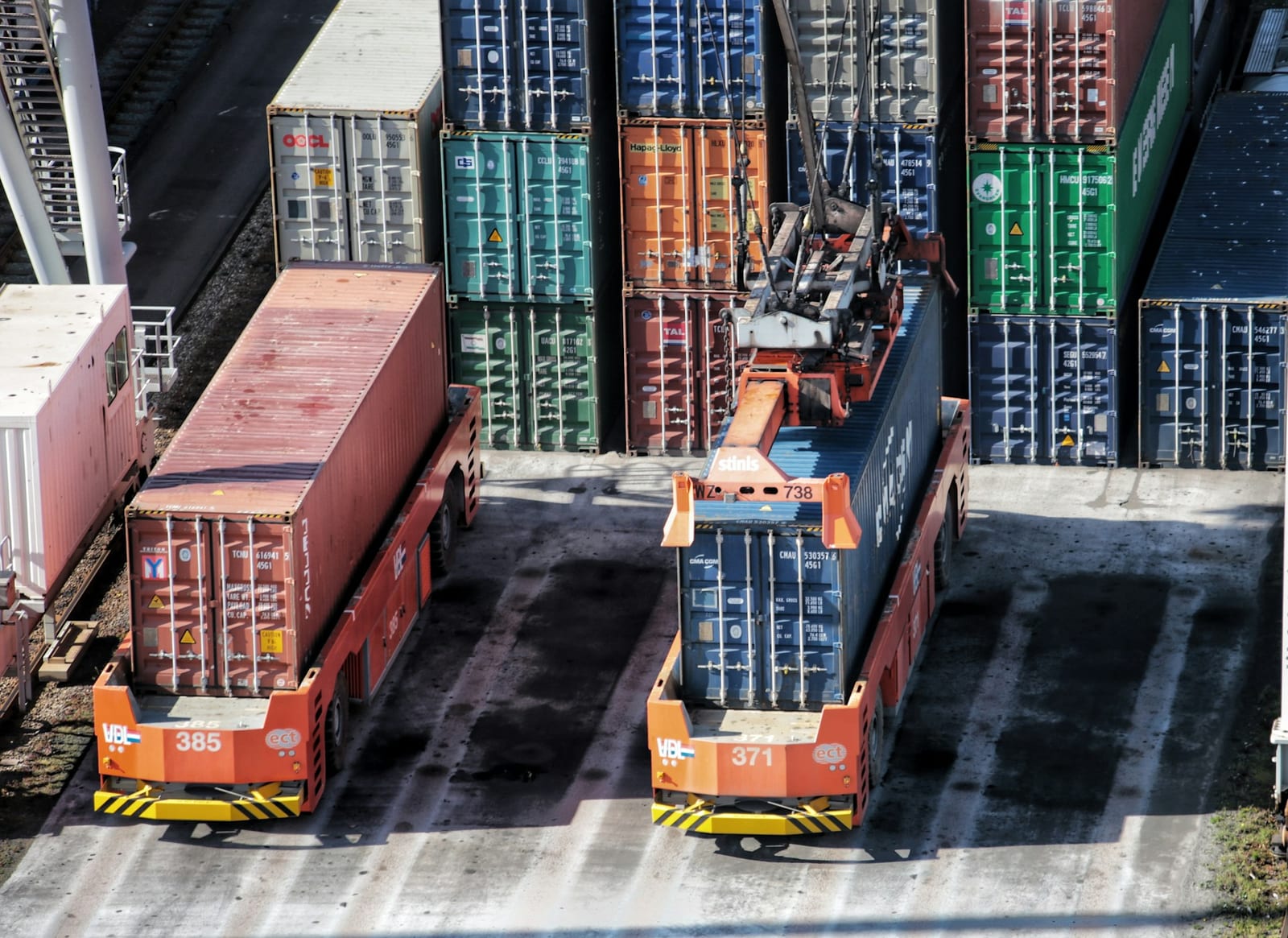 Containers at the port being loaded onto trucks